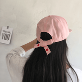 Gorra snapback con lazo en la espalda